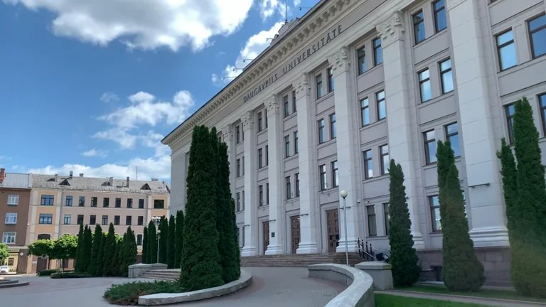 Daugavpils University main building beside its landscaped forecourt