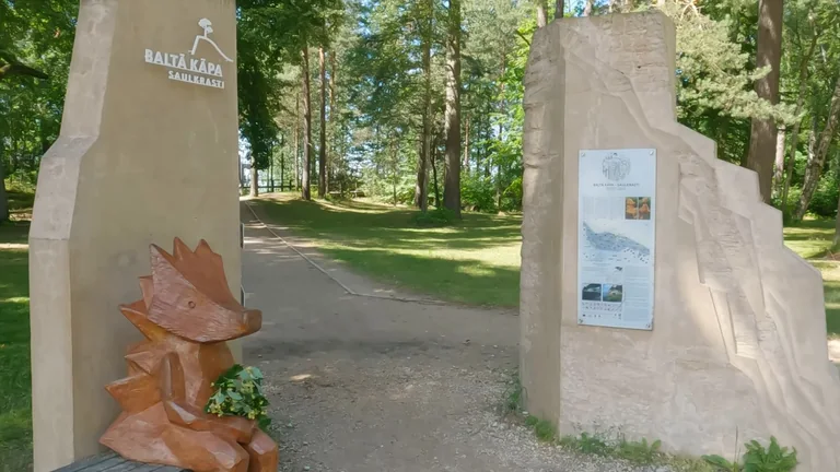 White Dune entrance gates and Frīda the Hedgehog in Saulkrasti